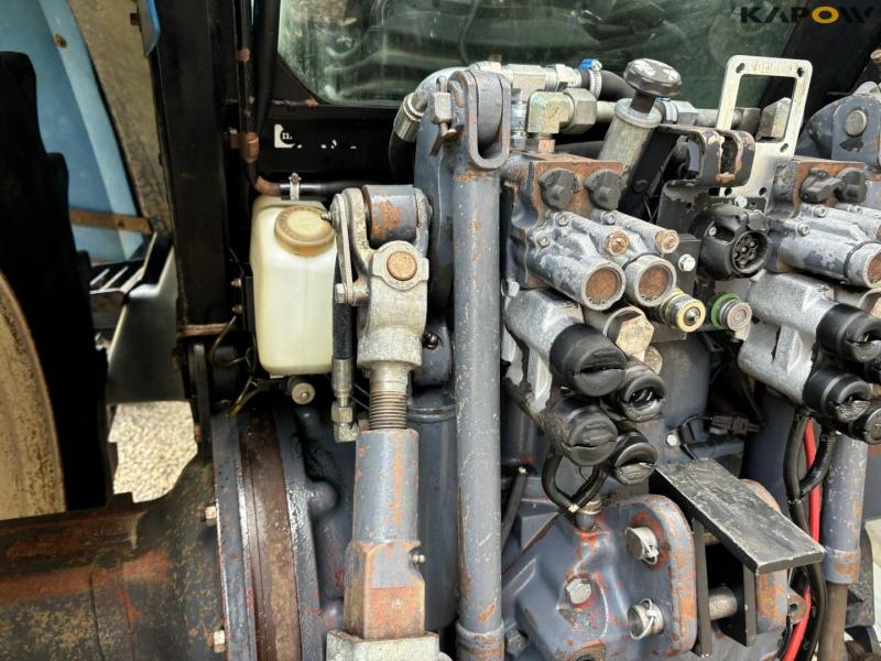 New Holland 8560 traktor med Hauer P-O-M S150 frontlæsser 35