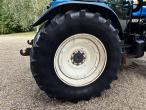 New Holland 8560 traktor med Hauer P-O-M S150 frontlæsser 84