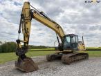 New Holland E215C gravemaskine 1