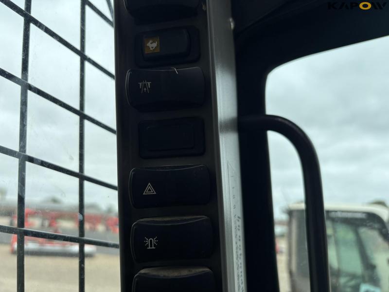 New Holland L318 minilæsser  58