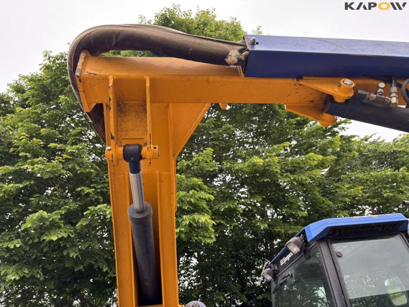 New Holland TS 115 med Bomford armklipper 76
