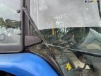 New Holland TS 115 med Bomford armklipper 21