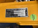 New Holland TS 115 med Bomford armklipper 66