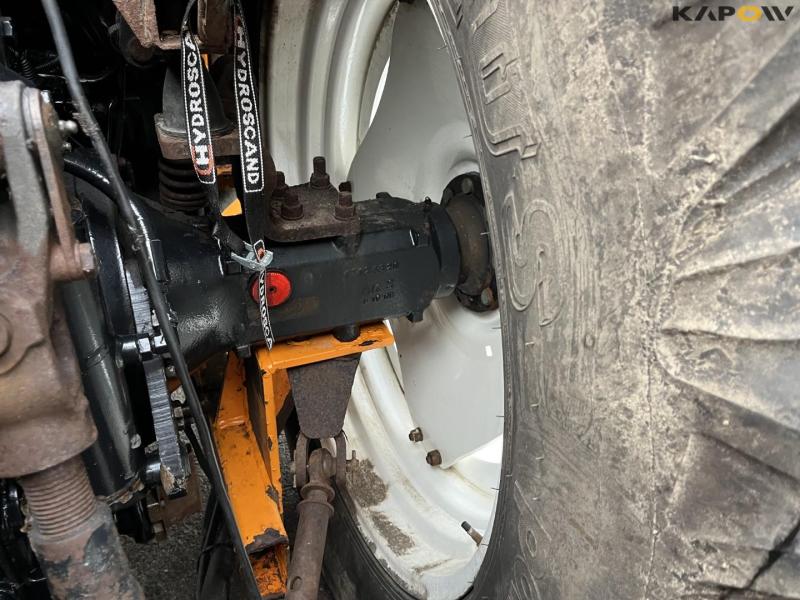 New Holland TS135A traktor med Epoke armklipper 28