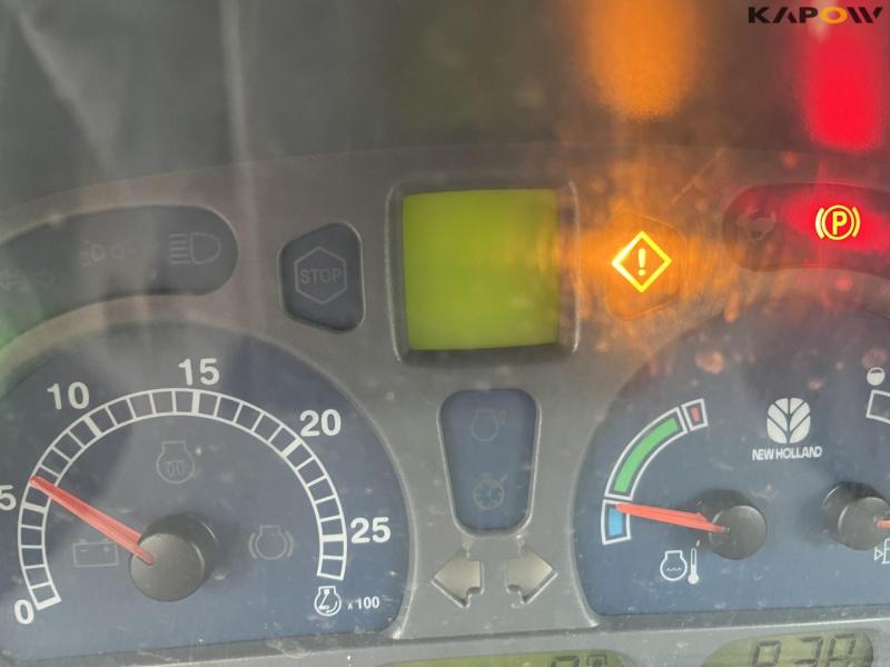 New Holland TS135A traktor med Epoke armklipper 35