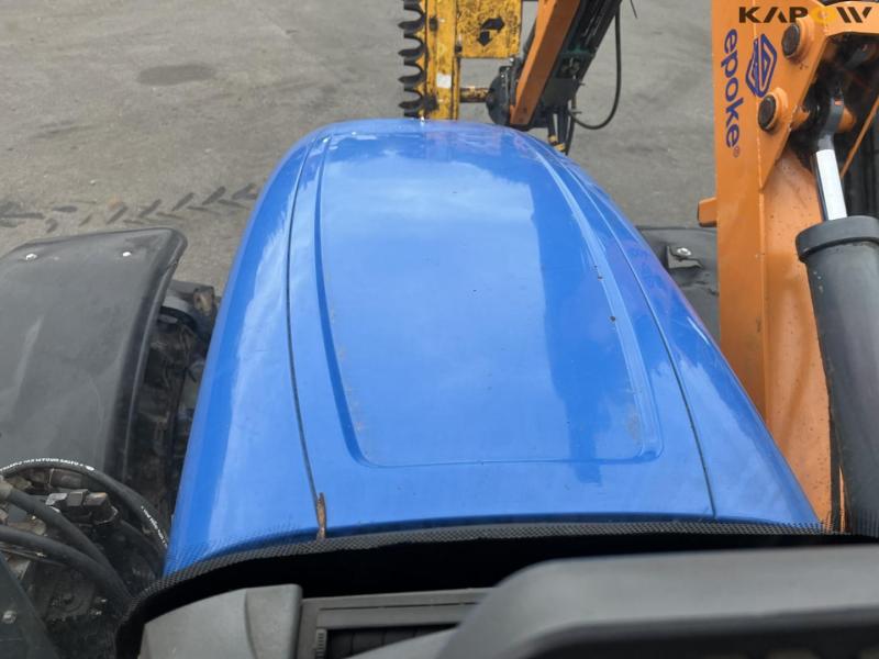 New Holland TS135A traktor med Epoke armklipper 38