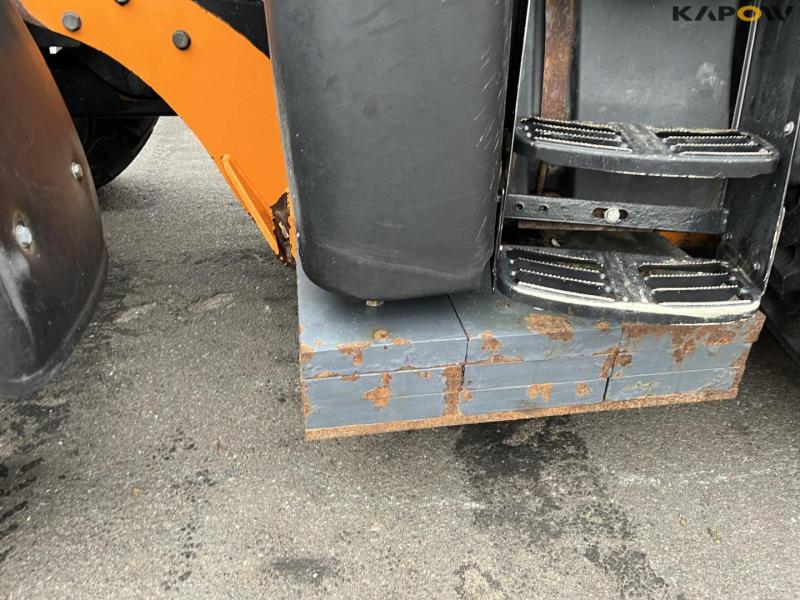 New Holland TS135A traktor med Epoke armklipper 42