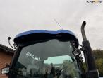New Holland TS135A traktor med Epoke armklipper 21