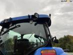 New Holland TS135A traktor med Epoke armklipper 24
