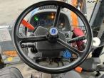 New Holland TS135A traktor med Epoke armklipper 34
