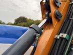 New Holland TS135A traktor med Epoke armklipper 49