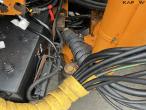 New Holland TS135A traktor med Epoke armklipper 52