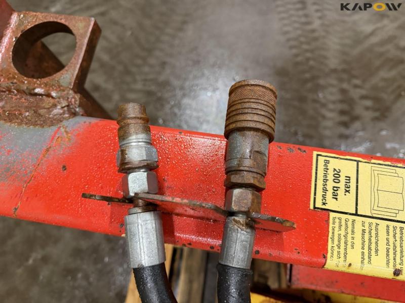 Rundballe ruller med John Deere hitch 15