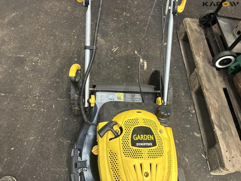 2 lawn mowers and grill 19
