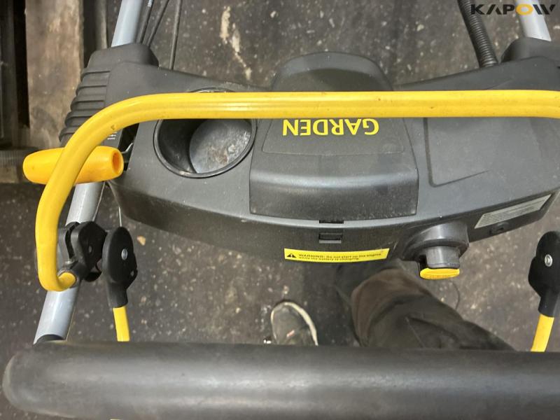 2 lawn mowers and grill 24