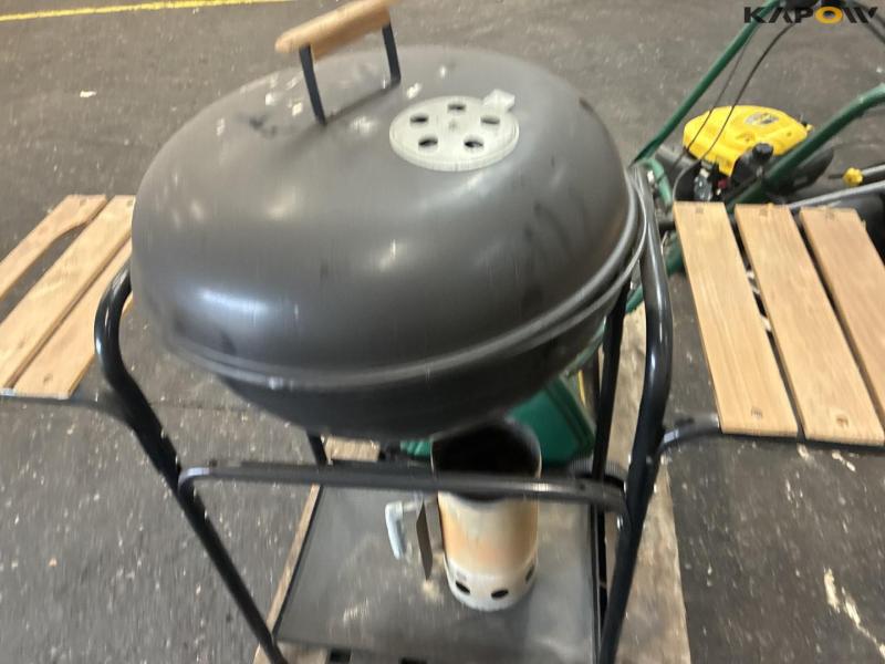 2 lawn mowers and grill 29
