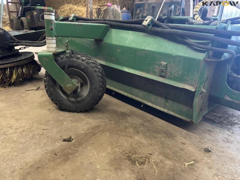 Avant sweeper with collector 9