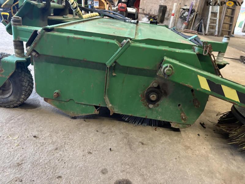 Avant sweeper with collector 16