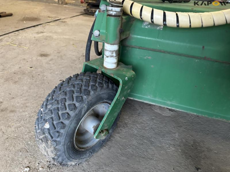 Avant sweeper with collector 20