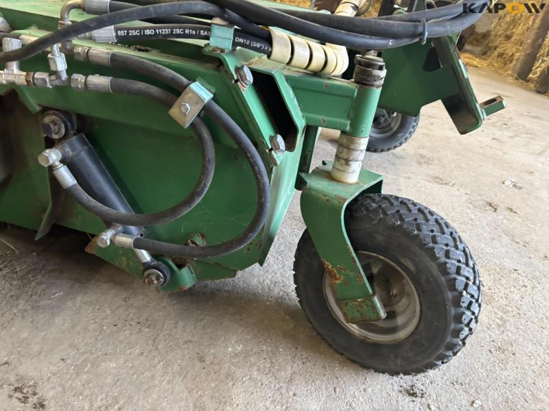 Avant sweeper with collector 21