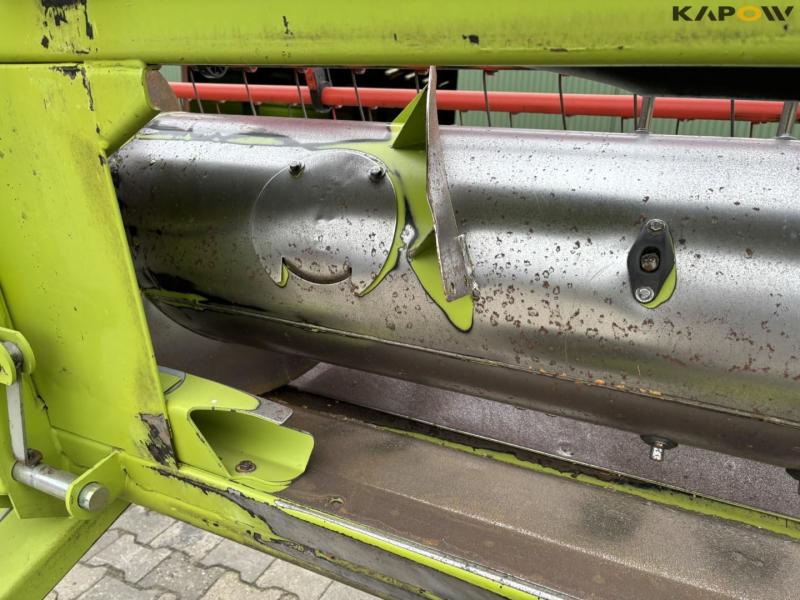 Claas 670 combine with V900 30ft header 122