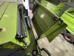 Claas 670 combine with V900 30ft header 58
