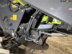 Claas 670 combine with V900 30ft header 68