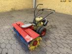 Clio tool carrier with broom 1