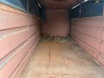 Container with closed sides that can be opened 21