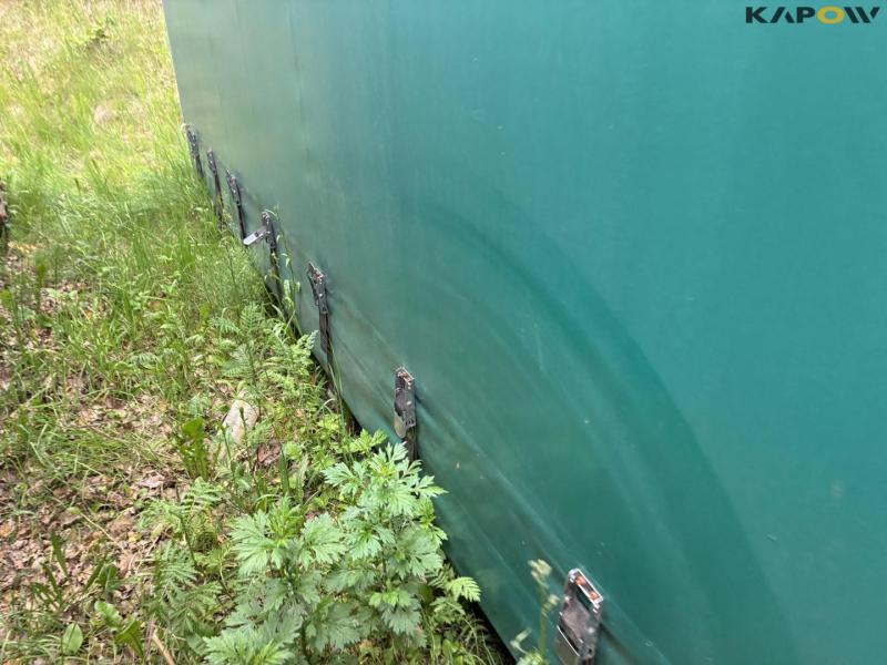 Container with tarpaulin roof and sides 13