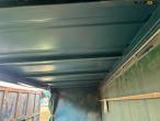 Container with tarpaulin roof and sides 24