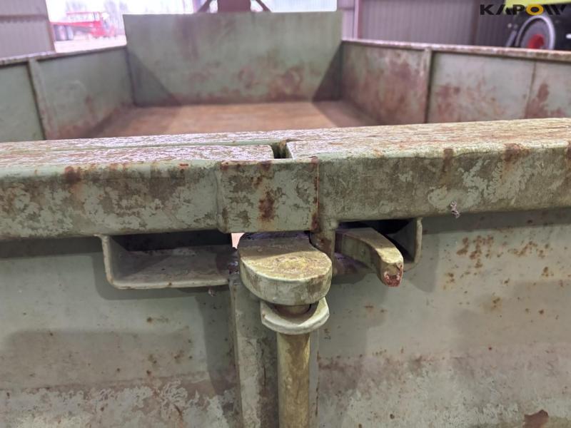 Container for hook and wire 23