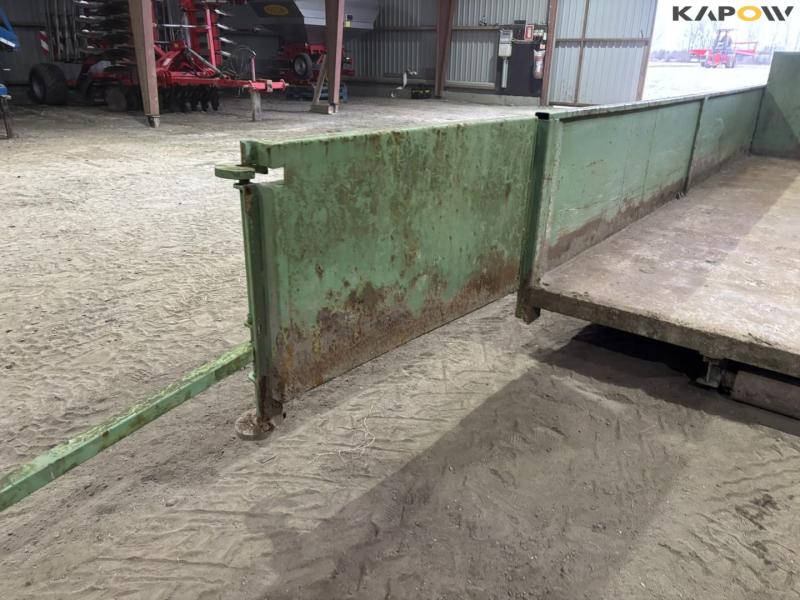 Container for hook and wire 28