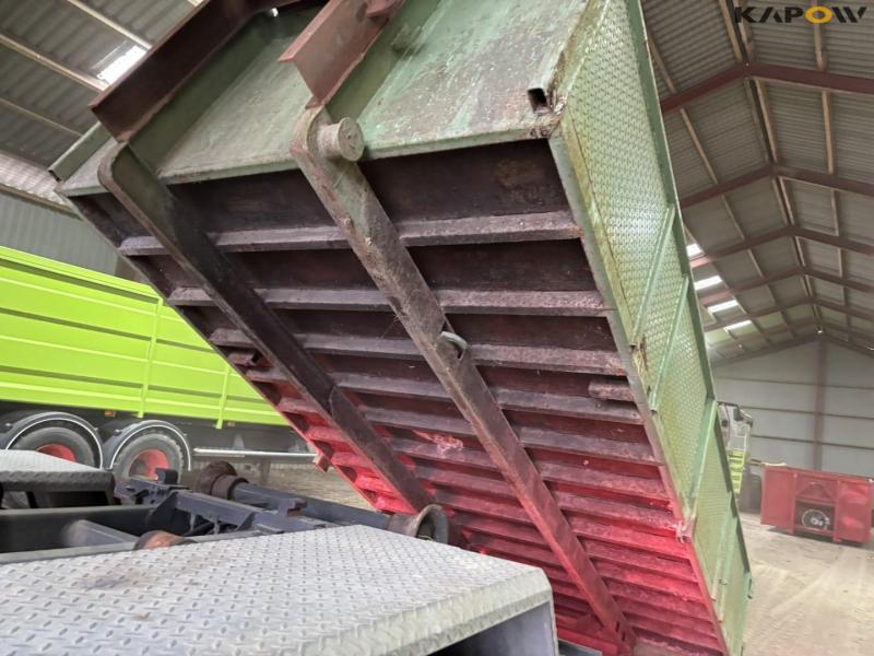 Container for hook and wire 38