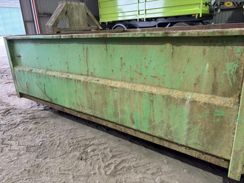 Container for hook and wire 23