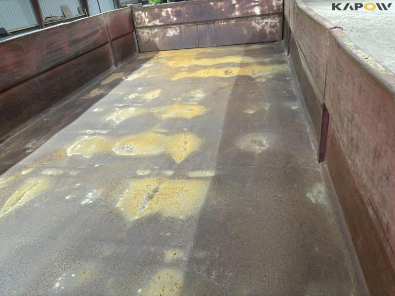 Container for hook and wire 26