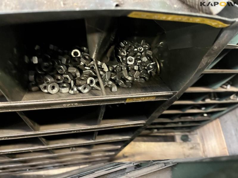 Various bolts, nuts and bolt racks. 13