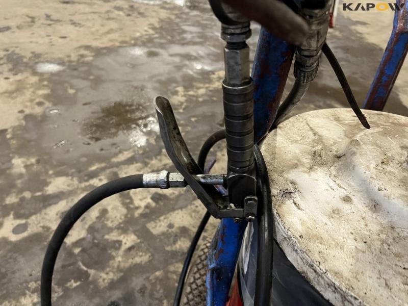 Grease pump with gun. 11