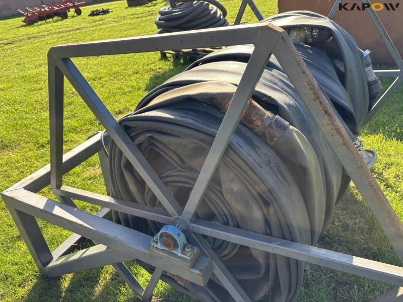 Hydraulic feed hose reel 28