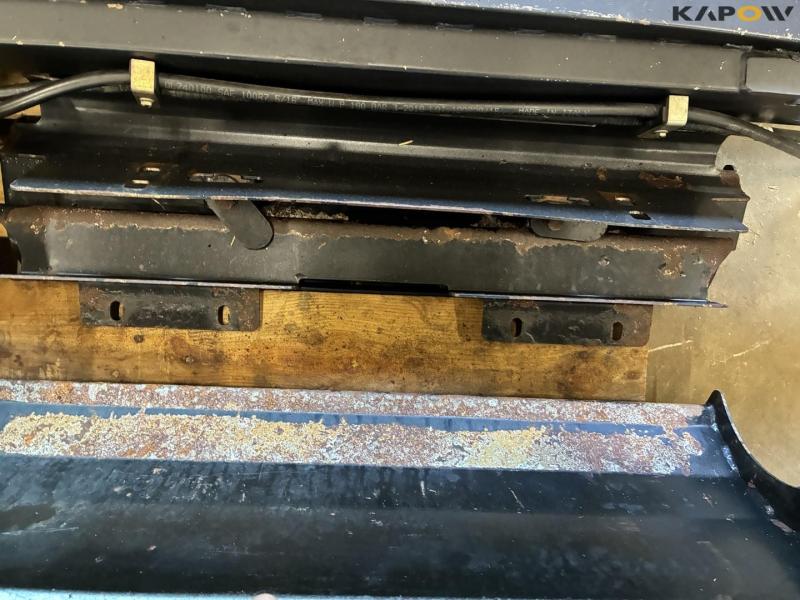 Extension spout for new Holland Fr. mower 7