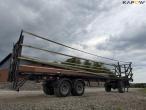Straw wagon with hydraulic bale securing 4