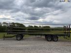 Straw wagon with hydraulic bale securing 7