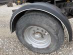 Straw wagon with hydraulic bale securing 35