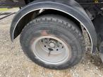 Straw wagon with hydraulic bale securing 45
