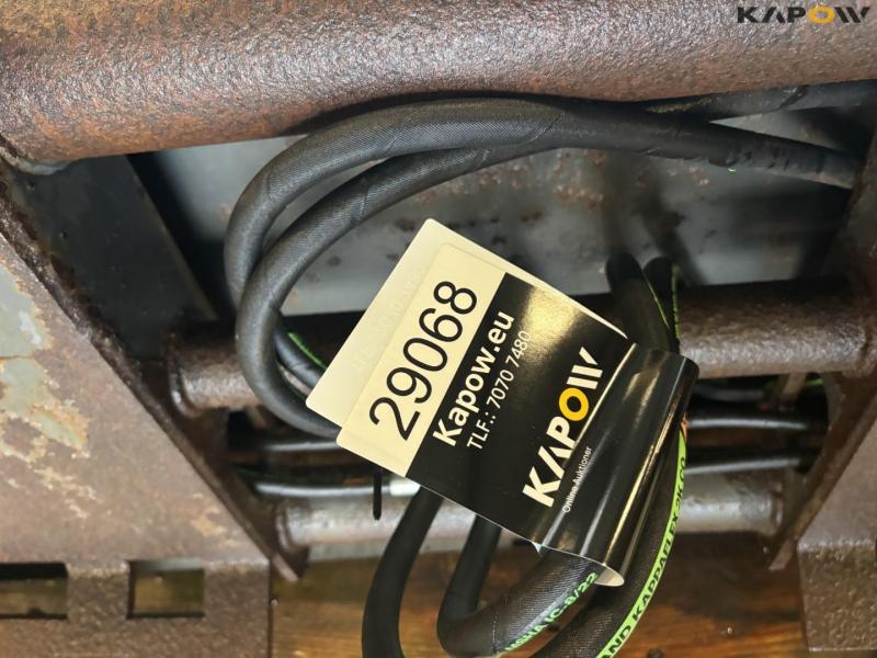 High-tip bucket with bobcat attachment 12