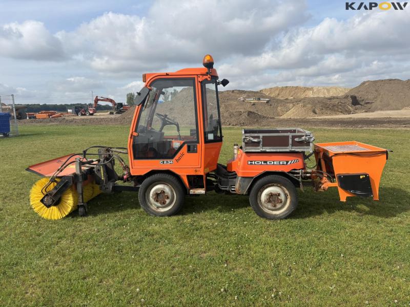 Holder C 2.34 with sweeper and salt spreader 8