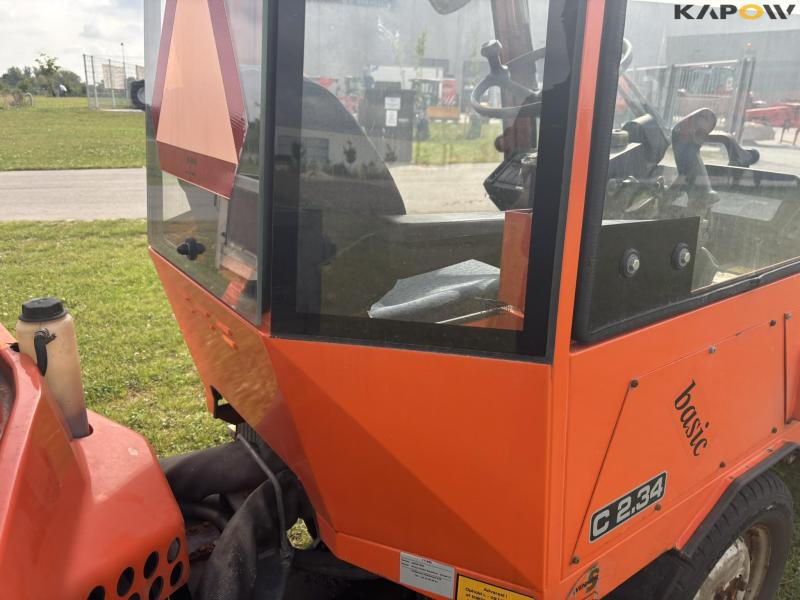 Holder C 2.34 with sweeper and salt spreader 38