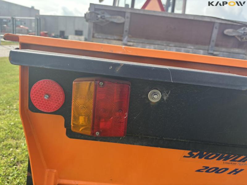 Holder C 2.34 with sweeper and salt spreader 55