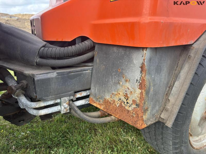 Holder C 2.34 with sweeper and salt spreader 72