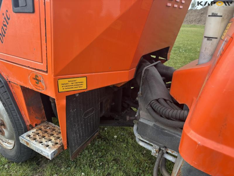 Holder C 2.34 with sweeper and salt spreader 75